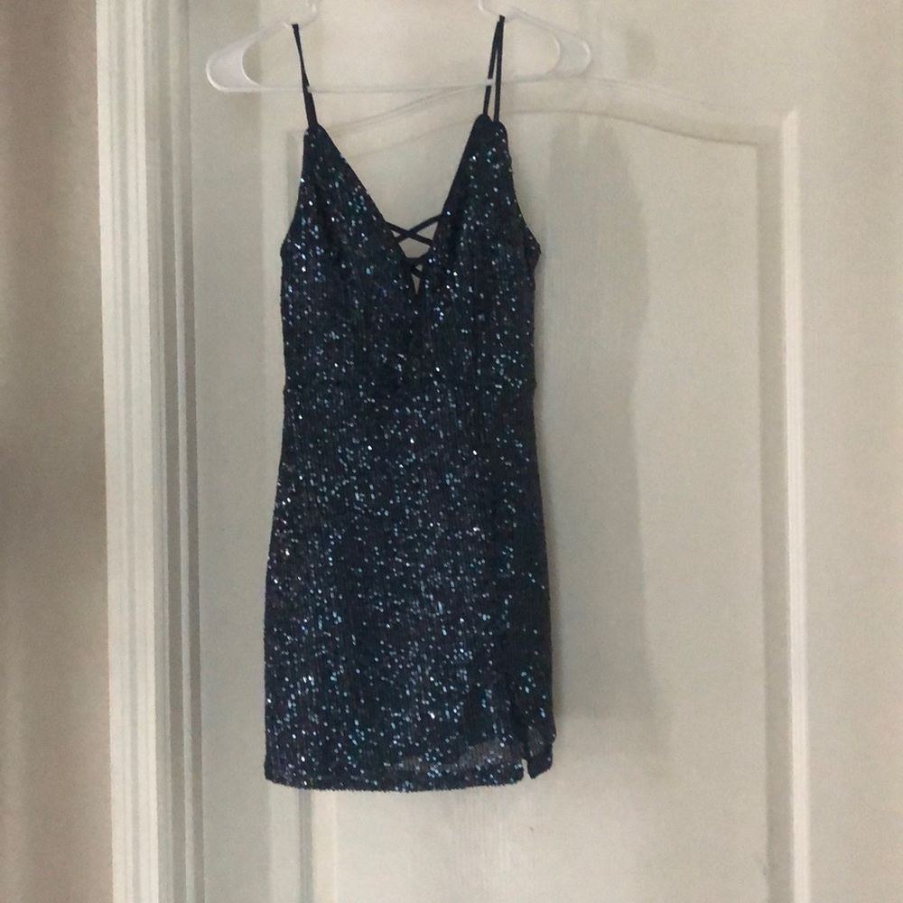 Blue/indigo sparkly dress. Only worn one time, size 3.
